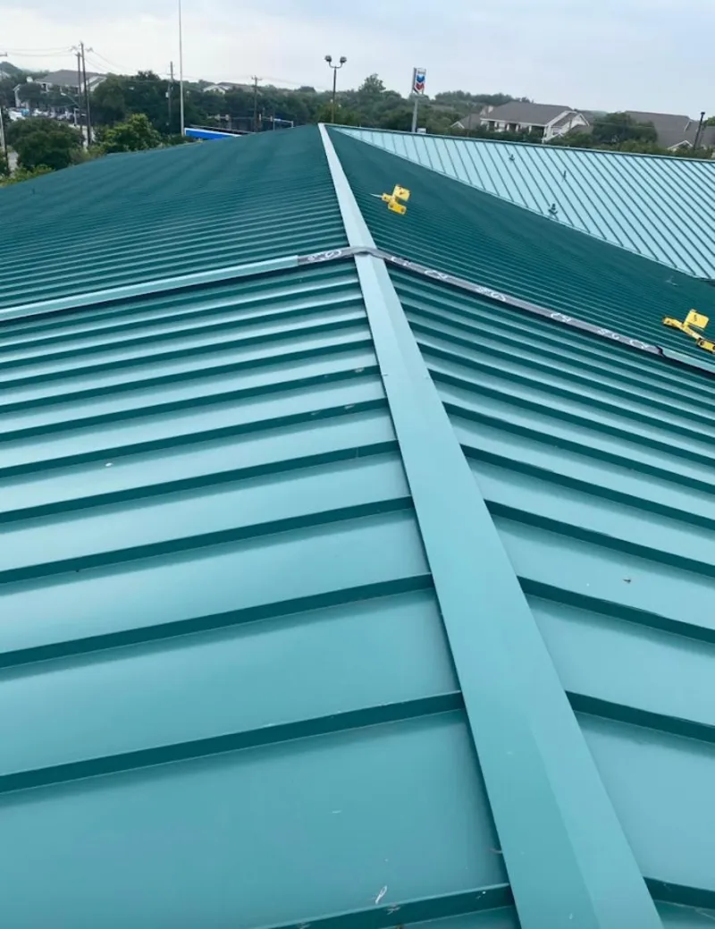 Green commercial metal roof ridge and valley for Metal Roof Repair in Guilford